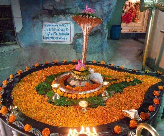The temple is believed to be over six thousand years old. It owns a natural shiva linga inside the cave.